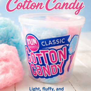 Classic pink and blue cotton candy tub from We R Nuts NY, Inc., featuring light fluffy carnival-style cotton candy in a resealable container.